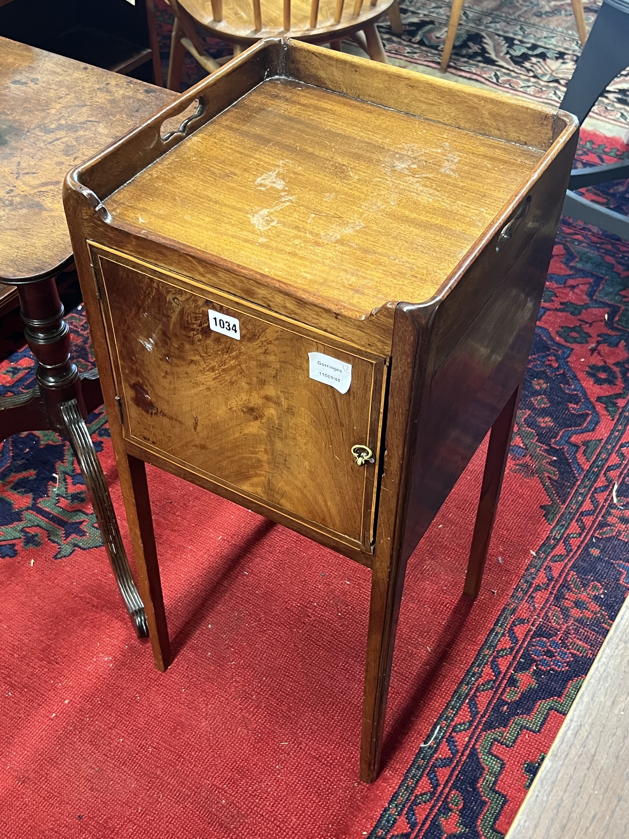 A George III mahogany tripod wine table, width 43cm, height 67cm together with a George III mahogany tray top bedside cabinet